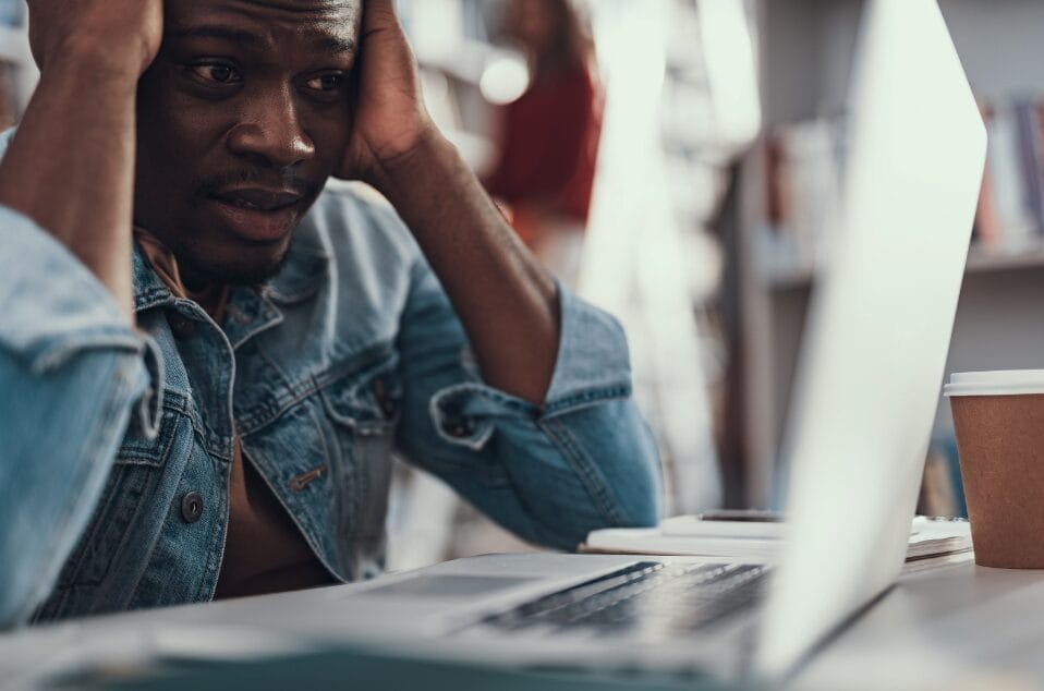 Man-staring-at-laptop