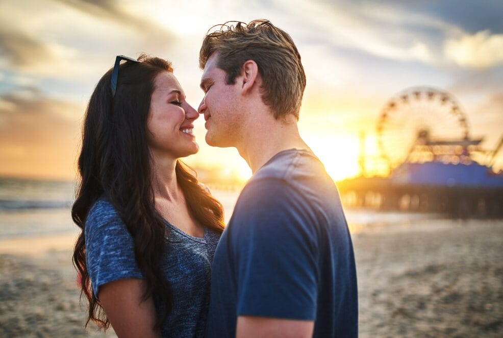 couple at the beach at dusk