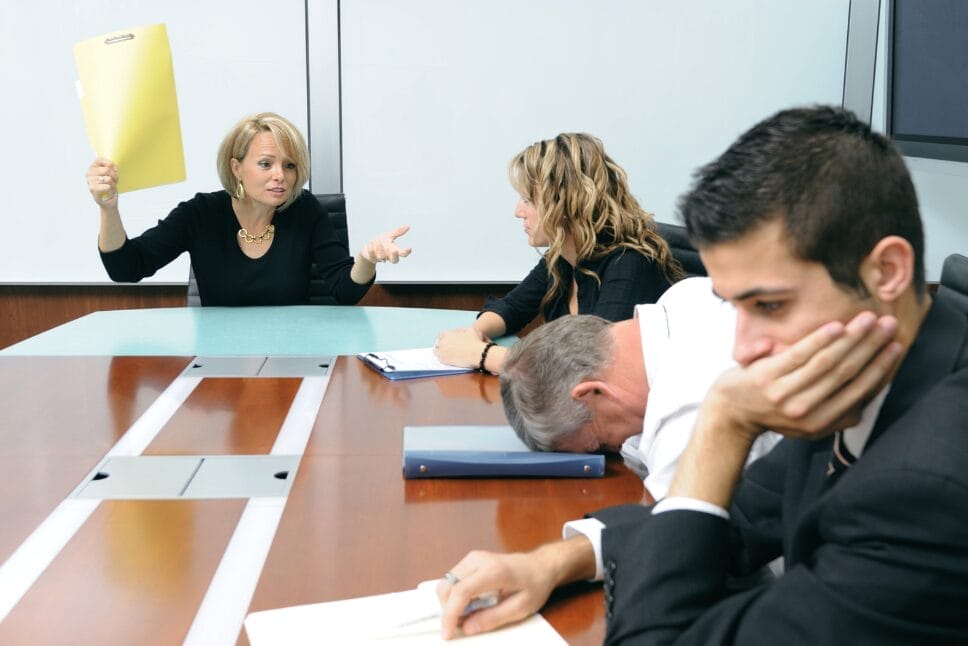 woman pushing away comments from employees