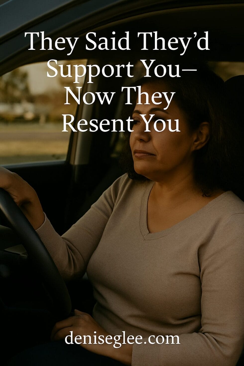 Afro-Latina woman in her 40s Poised. Intelligent. Reflective. Not sad—but done explaining. Setting: Sitting in the driver’s seat of a car parked in a quiet neighborhood or lot One hand lightly on the steering wheel, the other resting on her thigh or lap Eyes forward—not on the camera—with a calm, almost mournful stillness Her posture says, “I’ve outgrown this conversation.”