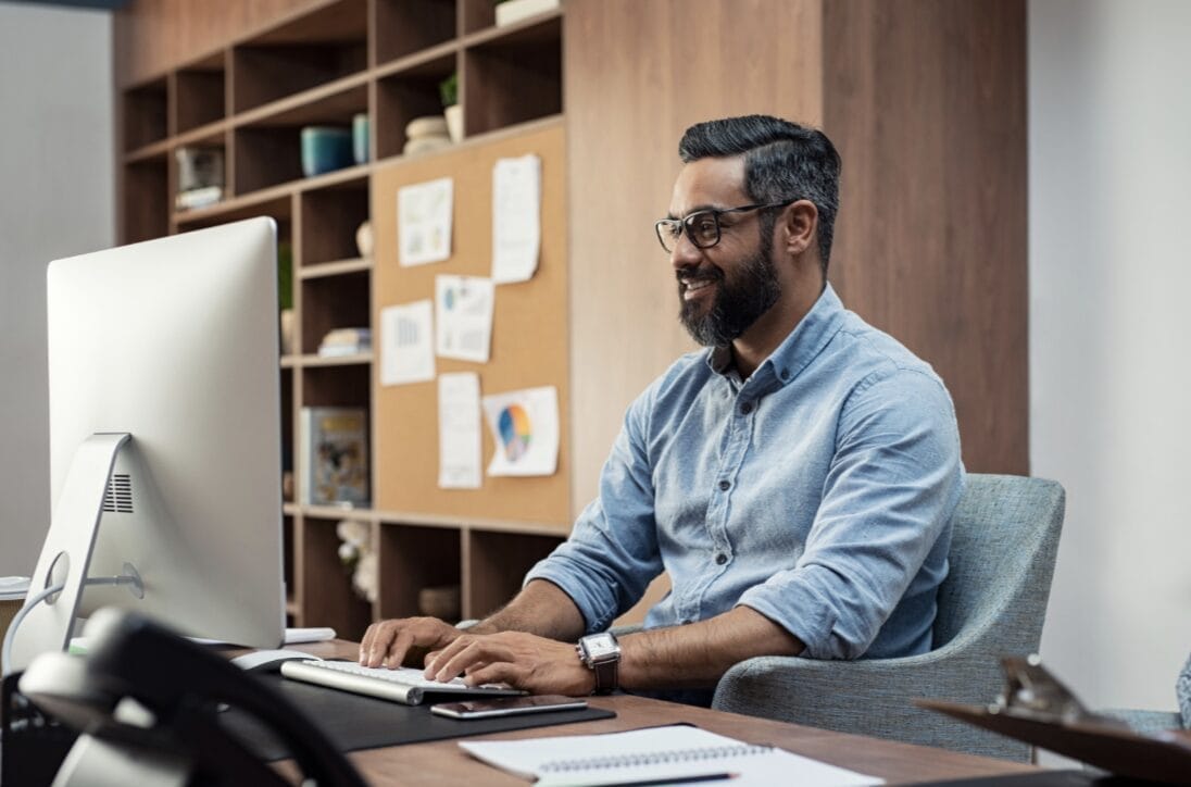 man at desk working