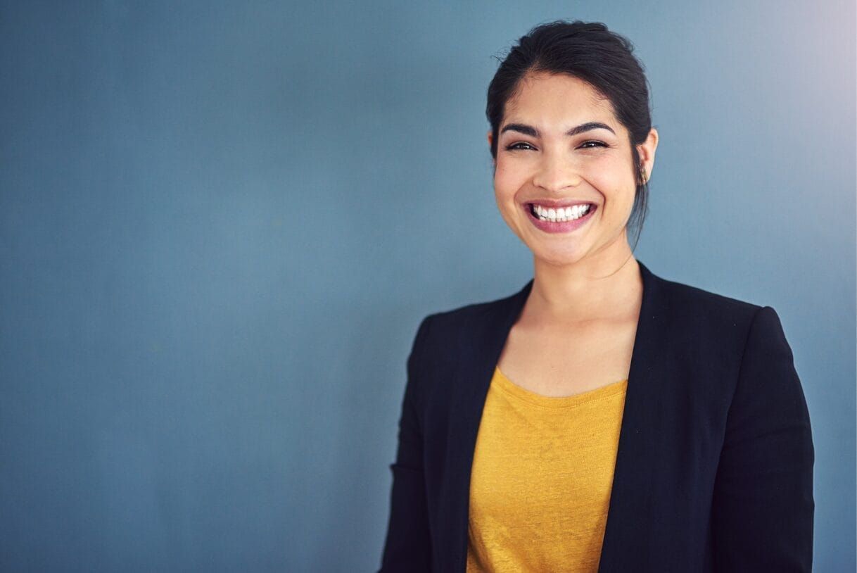 confident woman with blue blazer