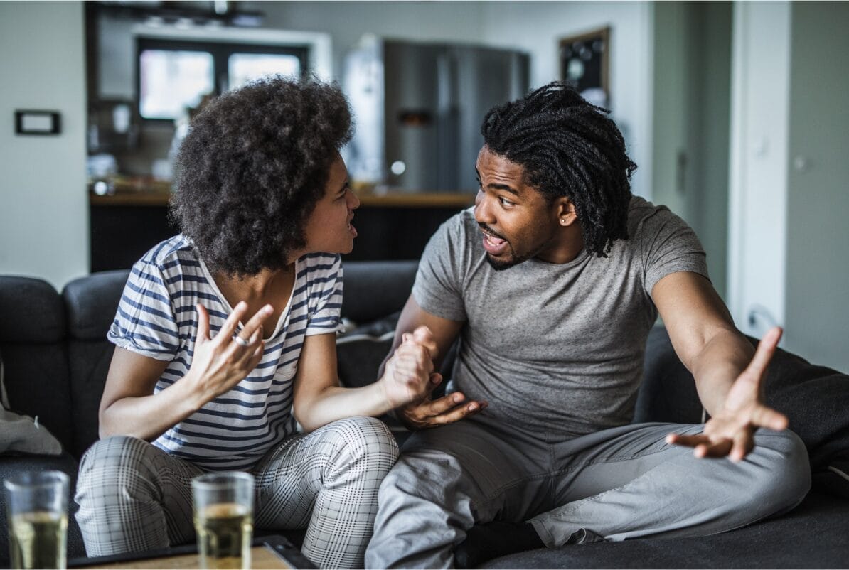 couple on couch arguing