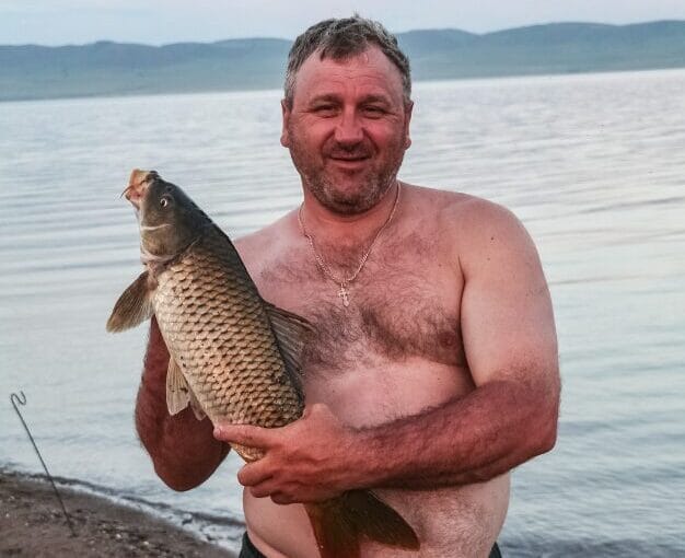 man holding a fish