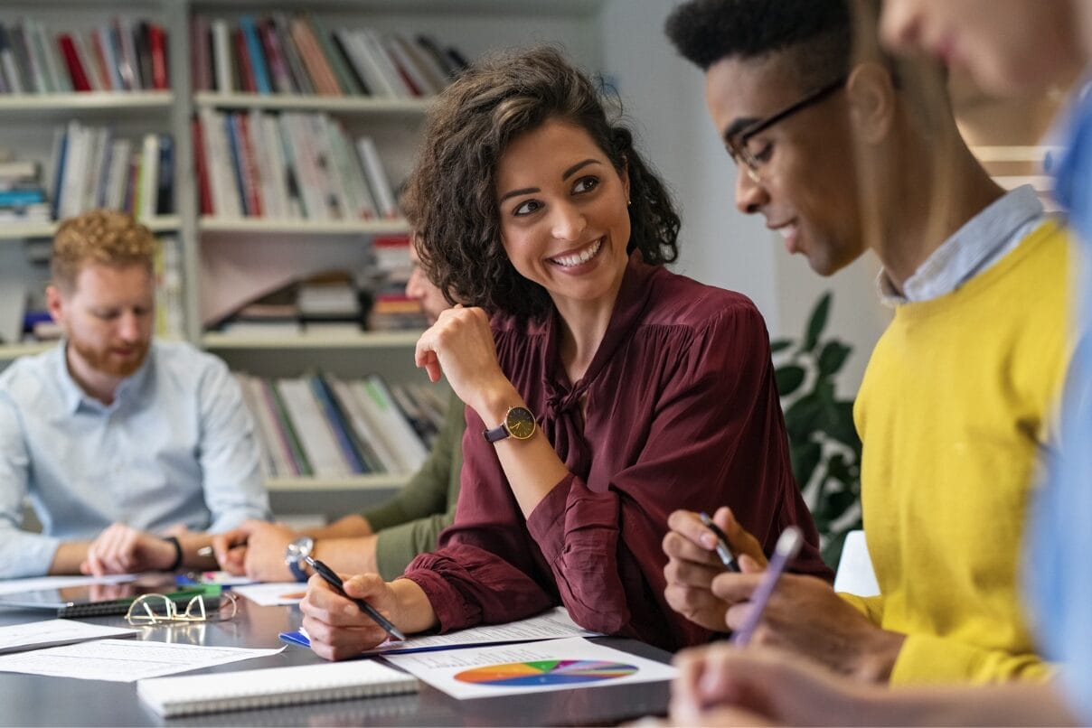 business meeting with woman smiling