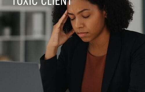 Frustrated Black woman at her desk, eyes closed in exhaustion, hand near laptop as if ready to shut it