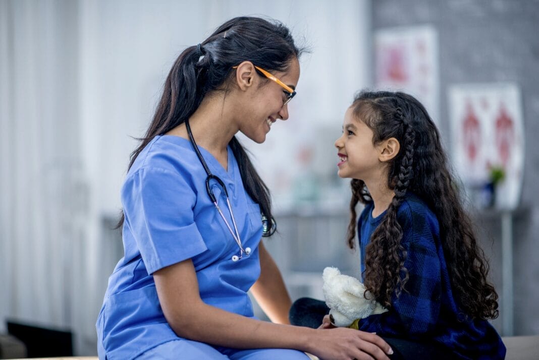 happy female doctor with patient