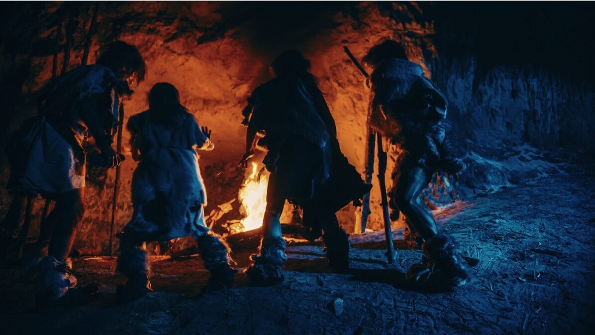 image of hunter gather in front of a fire