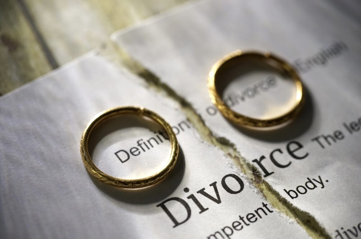 rings on ripped divorce papers