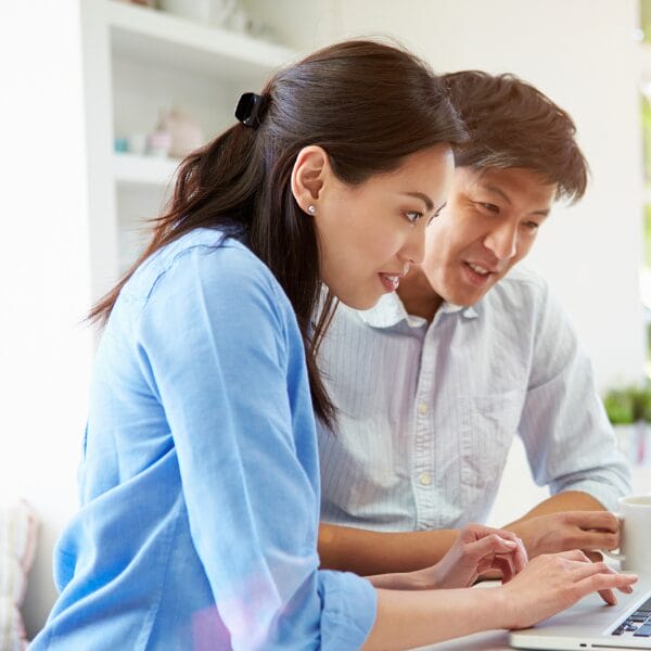 asian couple working