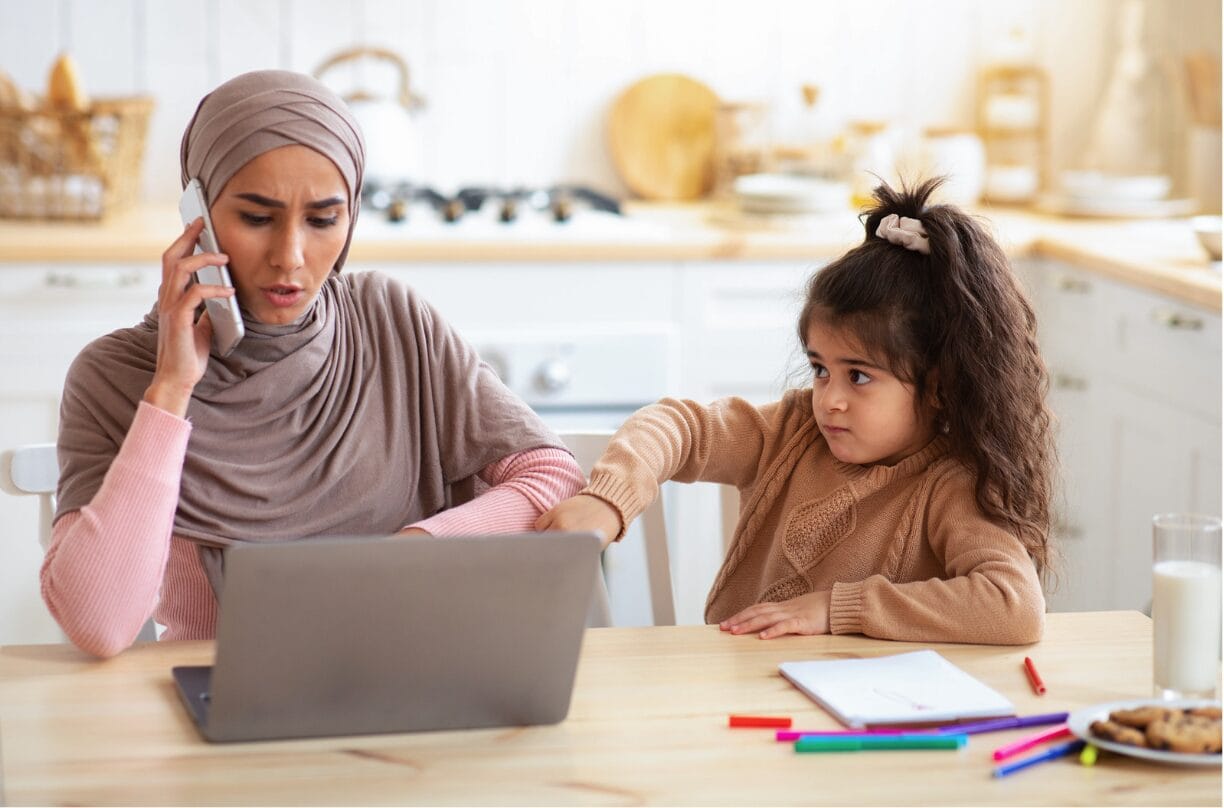 attention from mom distracted by computer and phone