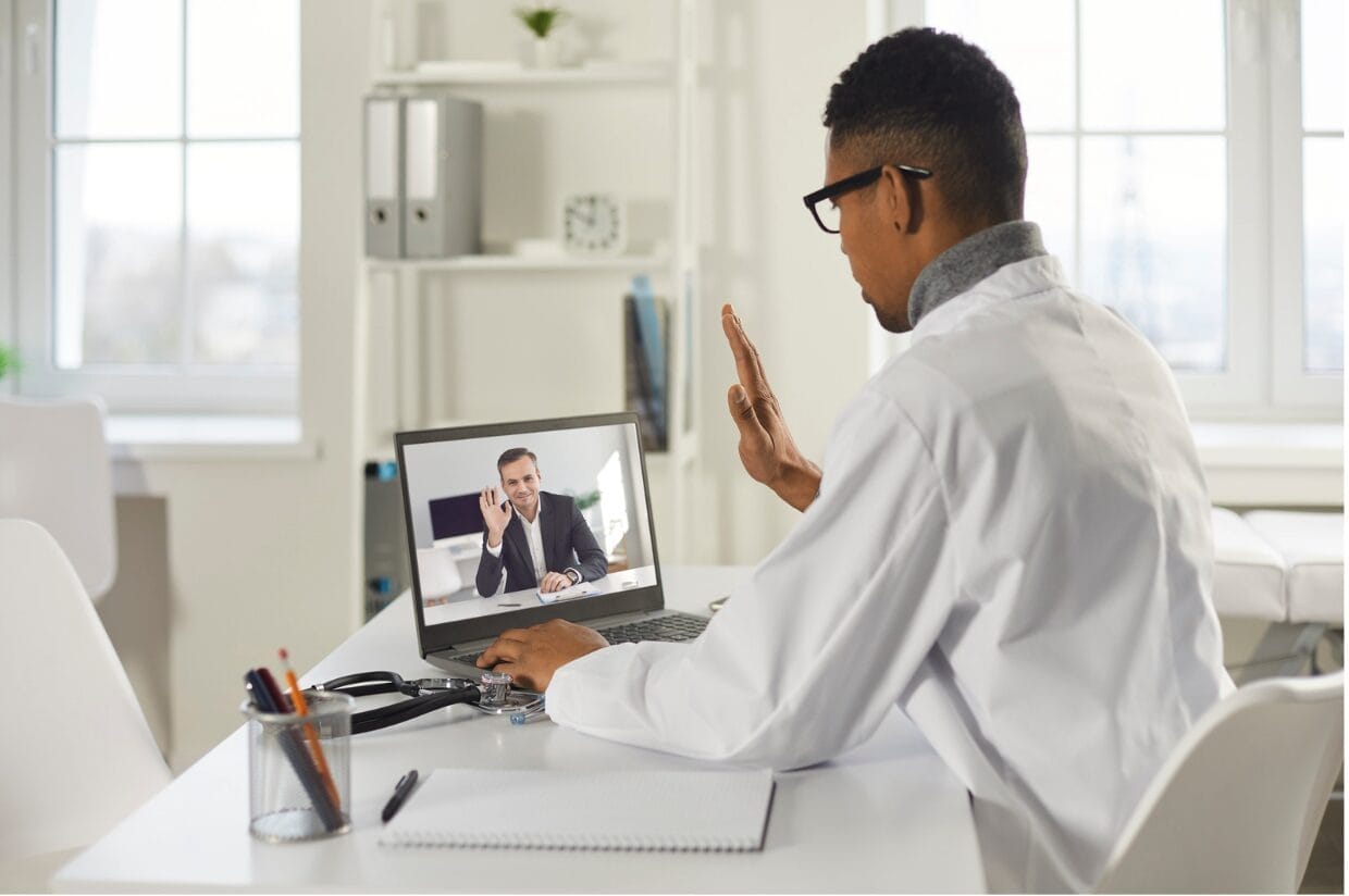 doctor in video call with patient