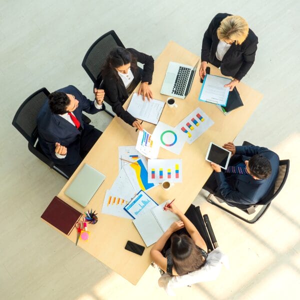 group of people with documents seating