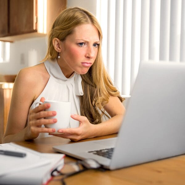 woman looking at computer