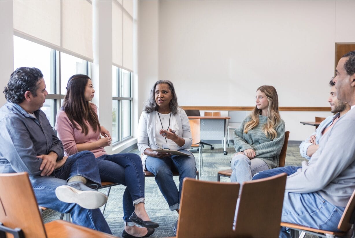 people meeting in a focys group