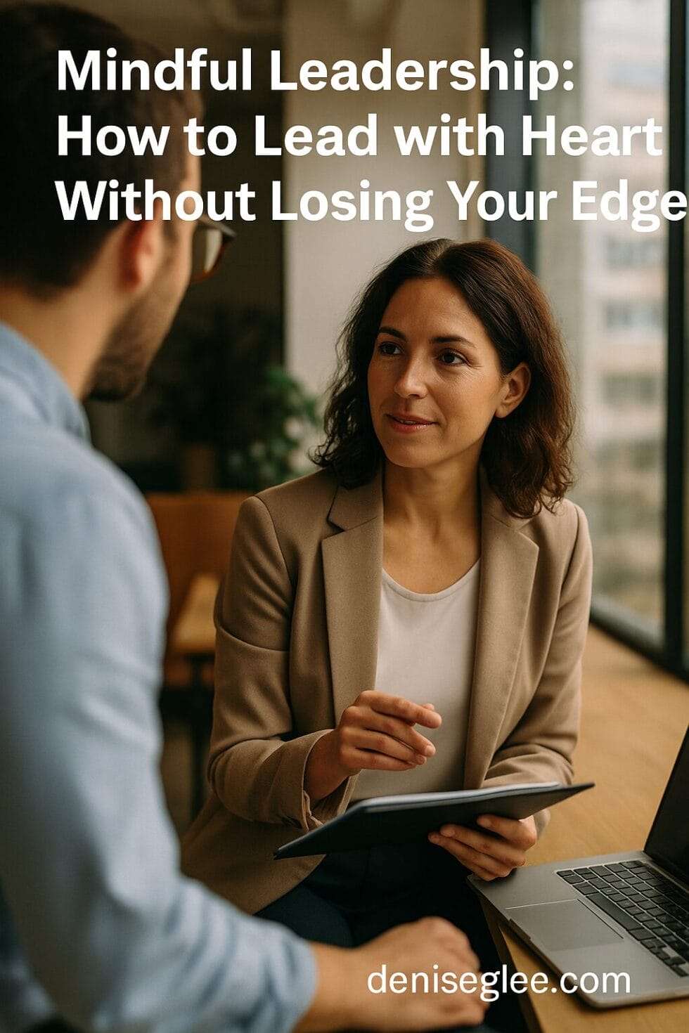 Woman in a modern office leading a mindful conversation with a colleague