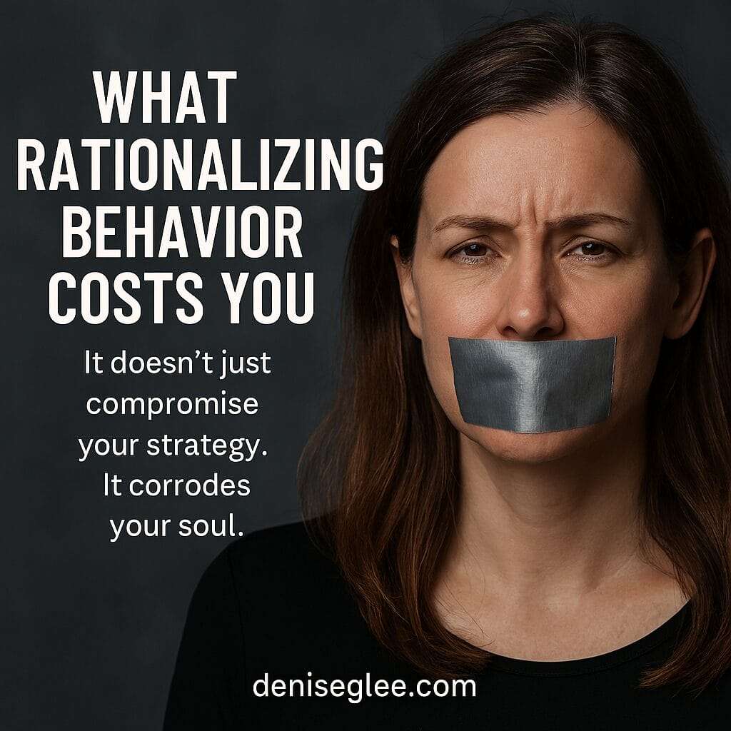 A woman with duct tape over her mouth stares into the camera with conflicted eyes, as bold white text reads “What Rationalizing Behavior Costs You – It doesn’t just compromise your strategy. It corrodes your soul,” capturing the emotional and professional toll of self-silencing.